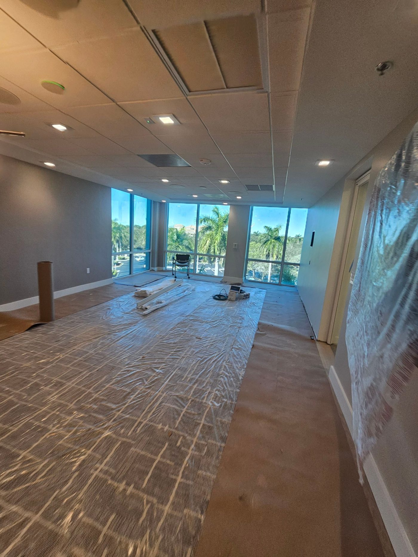 Finished drywall interior with recessed lighting and clean ceilings