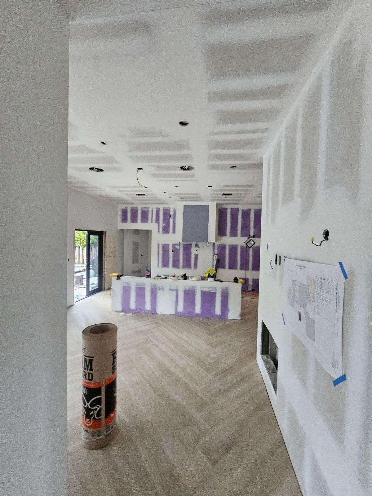 Interior with finished drywall walls and ceiling ready for paint